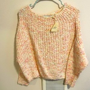 And the why Los Angeles pastel colored sweater